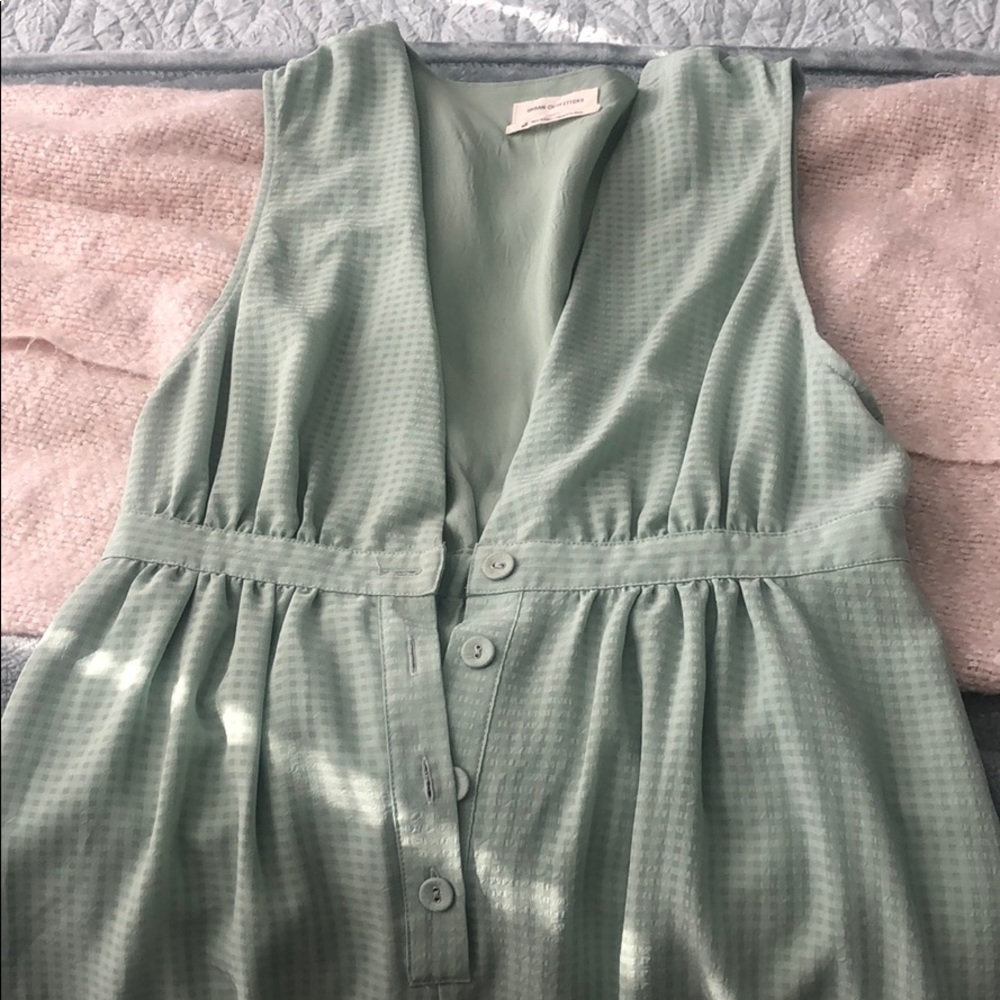 Green, deep V romper from Urban Outfitters.
